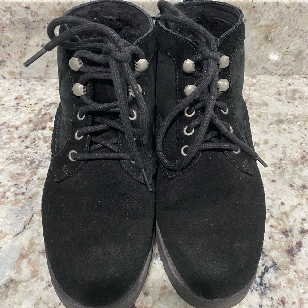 Black tie UGG boots.